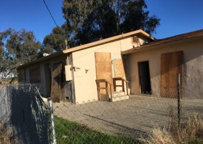 long view of house construction project of tlb builder